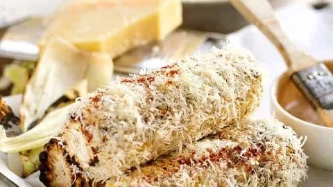 Delicious chipotle adobo grilled corn on the cob with spices and toppings