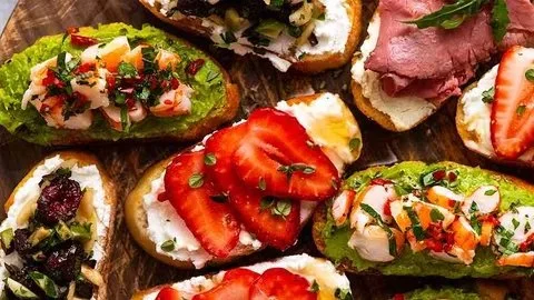 A platter of eight delicious crostini ideas with various toppings
