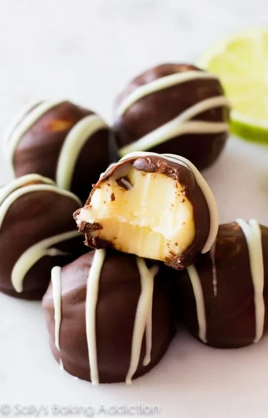 Delicious Key Lime Dark Chocolate Truffles displayed on a decorative plate