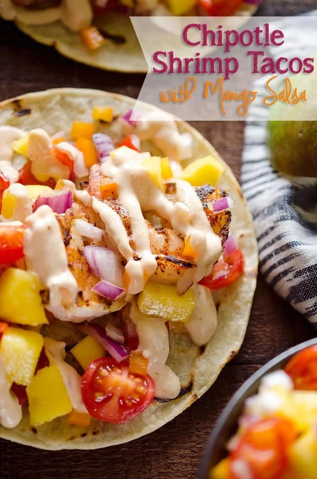 Mango Salsa Chipotle Shrimp Tacos served with fresh ingredients