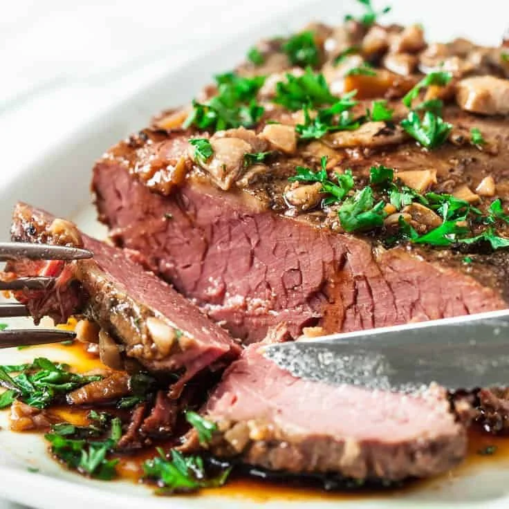 Slow cooker smoked brisket with savory seasoning and tender texture